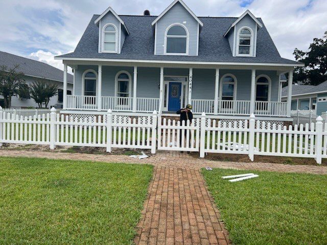 Classic White Picket Fence Installation in Pensacola, FL