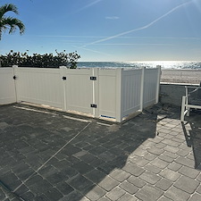 Coastal-Privacy-Style-Vinyl-Fence-on-a-Seawall-in-Indian-Shores-Bradenton 1