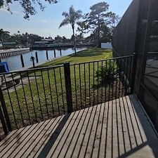 Sleek-Black-Aluminum-Fence-for-Pool-Canal-Views 0